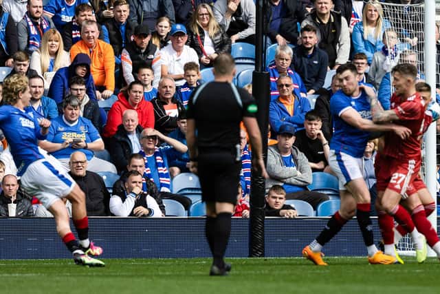 Todd Cantwell volleys home Rangers' winning goal against Aberdeen at Ibrox.