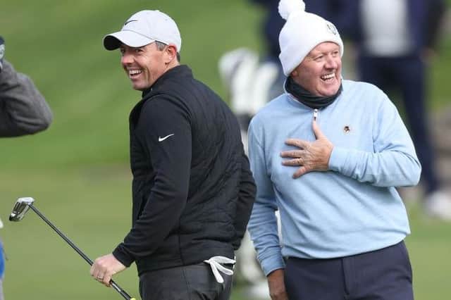 Rory McIlroy and his father Gerry share a laugh after a practice round on the Old Course at St Andrews ahead of the Alfred Dunhill Links Championship. Picture: Oisin Keniry/Getty Images.