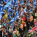 Mass displays of identical flags can have ugly historical resonances (Picture: Andy Buchanan/AFP via Getty Images)