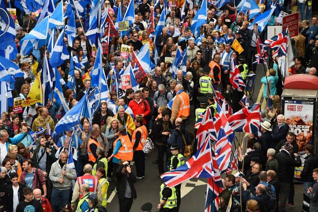 Mass displays of identical flags can have ugly historical resonances (Picture: Andy Buchanan/AFP via Getty Images)