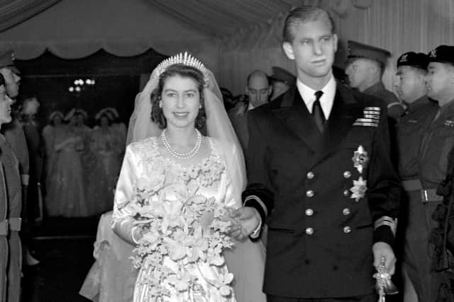 File photo dated 20/11/1947 of Princess Elizabeth and the Duke of Edinburgh (formerly Lt Philip Mountbatten, RN) as they leave Westminster Abbey after their marriage ceremony.