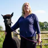 Helen Macdonald with Geronimo the alpaca at Shepherds Close Farm in Wooton Under Edge, Gloucestershire, after losing a last-ditch High Court bid to save him. The animal has twice tested positive for bovine tuberculosis and, as a result, the Department for Environment, Food and Rural Affairs (Defra) has ordered its destruction (Photo: Jacob King).
