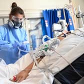 A Covid patient is treated in intensive care in May 2020 (Picture: Neil Hall/pool/AFP via Getty Images)