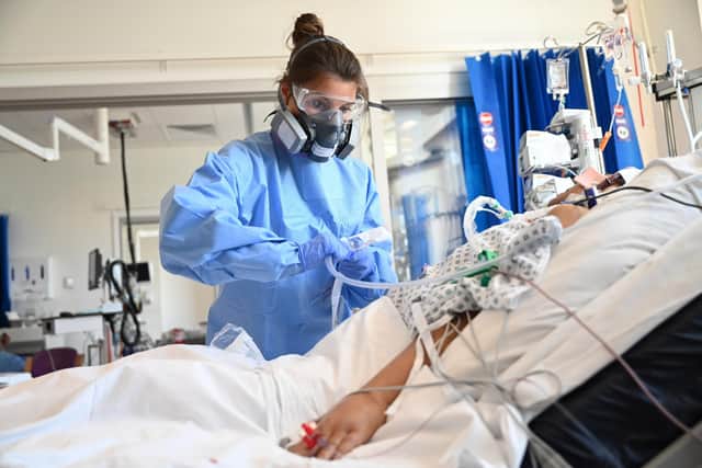 A Covid patient is treated in intensive care in May 2020 (Picture: Neil Hall/pool/AFP via Getty Images)