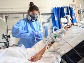 A Covid patient is treated in intensive care in May 2020 (Picture: Neil Hall/pool/AFP via Getty Images)