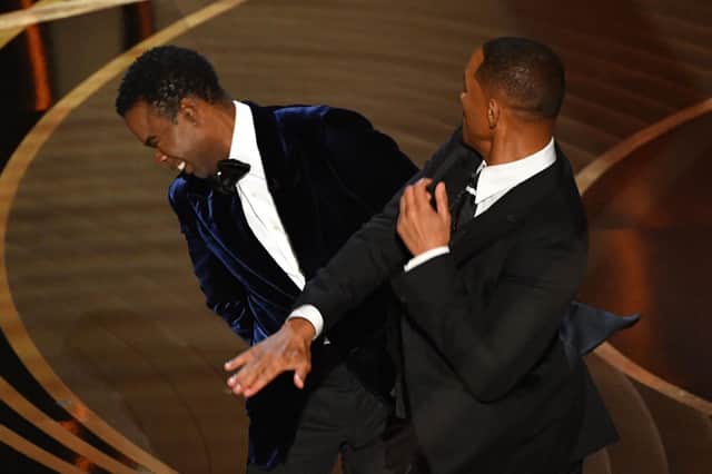 Will Smith slaps Chris Rock onstage during the 94th Oscars at the Dolby Theatre in Hollywood, California (Picture: Robyn Beck/AFP via Getty Images)