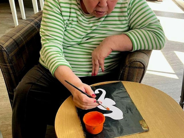 Resident at HC-One Scotland’s Redmill Care Home taking part in Creative Mojo Workshop