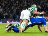 Kilmarnock appeal for a penalty as defender Joe Wright falls under a challenge from Celtic’s Giorgos Giakoumakis. (Photo by Alan Harvey / SNS Group)