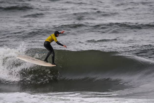 Ansel Parkin, surfing in the final of the Scottish National Longboard Championships at Pease Bay PIC: Malcolm Anderson