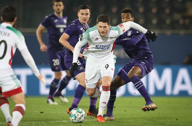Thomas Henry looks to escape the attentions of Anderlecht's Hannes Delcroix fight for the ball during a Jupiler Pro League clash