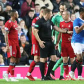 Aberdeen's Scott Brown complains to referee John Beaton during the 2-2 draw with Rangers at Ibrox. Picture: SNS