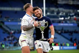 Stuart Hogg, wearing an Italy jersey, congratulates Ali Price on his man of the match performance. Photo by Ryan Byrne/INPHO/Shutterstock
