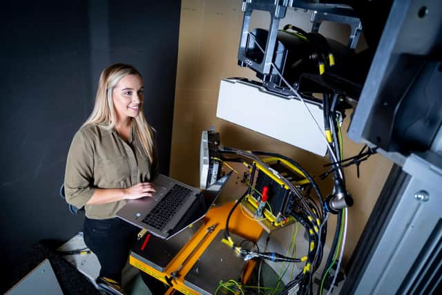 Photo of Jordanne Currie, Electronics Engineer, in the Osprey Lab Roof.