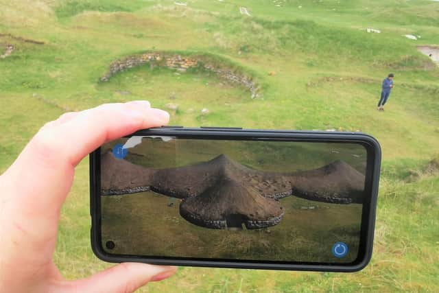 Augmented reality archaeology at Cladh Hallan. Credit - Uist Virtual Archaeology Project