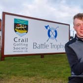 Schloss Roxburghe player Jack McDonald shows off the Battle Trophy after storming to a nine-shot success at Crail Golfing Society. Picture: Kenny Smith