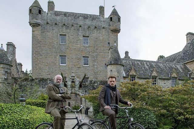 Sam Heughan and Graham McTavish at Cawdor Castle PIC: Peter Sandground