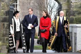 Prince William and Kate Middleton pass St Salvator's halls, accompanied by Sir Menzies Campbell (right), during a visit to St Andrews University. Picture Andrew Milligan/PA Wire