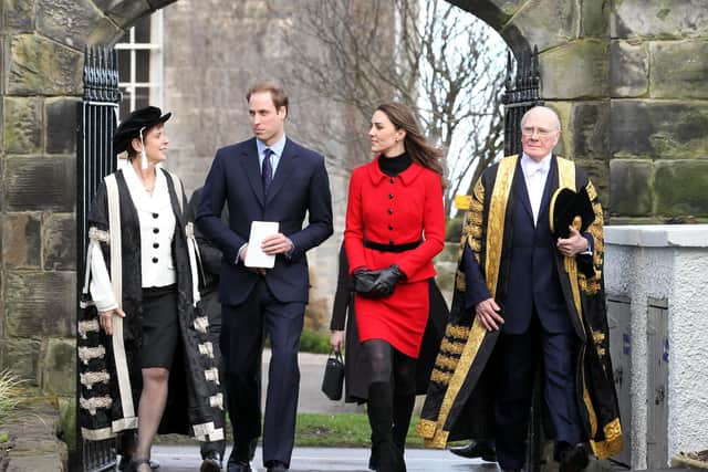 Prince William and Kate Middleton pass St Salvator's halls, accompanied by Sir Menzies Campbell (right), during a visit to St Andrews University. Picture Andrew Milligan/PA Wire