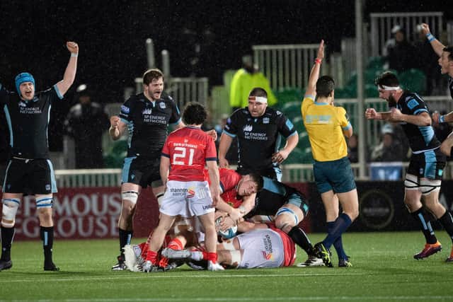 Glasgow players celebrate at the full time whistle during a United Rugby Championship match between Glasgow Warriors and Munster at Scotstoun Stadium, on February 11, 2022, in Glasgow, Scotland. (Photo by Ross MacDonald / SNS Group)