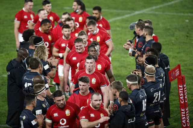 Sharks players form a guard of honour for the British and Irish Lions following the tourists' 54-7 win.