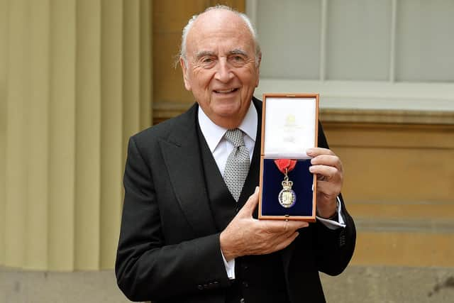 Lord Young of Graffham, David Young holds his insignia of member of the Order of the Companions of Honour after it was presented to him by the Prince of Wales in 2015 (Photo by John Stillwell - WPA Pool/Getty Images)