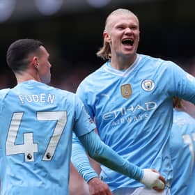 Erling Haaland of Manchester City celebrates scoring his team's first goal during the Premier League match between Manchester City and Everton FC at Etihad Stadium on February 10, 2024 in Manchester, England. (Photo by Alex Livesey/Getty Images)