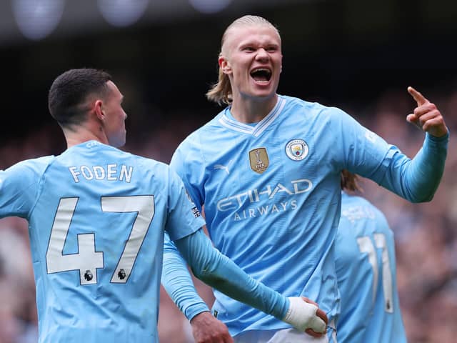 Erling Haaland of Manchester City celebrates scoring his team's first goal during the Premier League match between Manchester City and Everton FC at Etihad Stadium on February 10, 2024 in Manchester, England. (Photo by Alex Livesey/Getty Images)