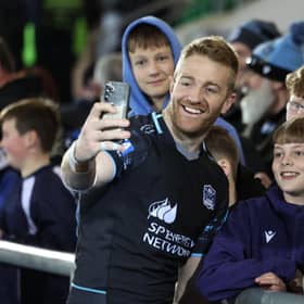 Glasgow Warriors captain Kyle Steyn with fans after the 21-10 win over Hollywoodbets Sharks at Scotstoun Stadium. (Photo by Ross MacDonald / SNS Group)