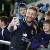 Glasgow Warriors captain Kyle Steyn with fans after the 21-10 win over Hollywoodbets Sharks at Scotstoun Stadium. (Photo by Ross MacDonald / SNS Group)