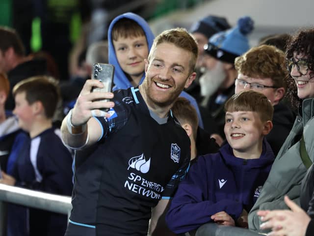 Glasgow Warriors captain Kyle Steyn with fans after the 21-10 win over Hollywoodbets Sharks at Scotstoun Stadium. (Photo by Ross MacDonald / SNS Group)