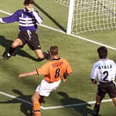 Netherlands legend Dennis Bergkamp scores his iconic last minute winner against Argentina in the 1998 World Cup finals (Photo credit should read GEORGES GOBET/AFP via Getty Images)