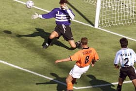 Netherlands legend Dennis Bergkamp scores his iconic last minute winner against Argentina in the 1998 World Cup finals (Photo credit should read GEORGES GOBET/AFP via Getty Images)