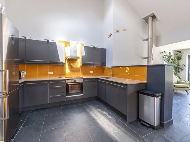 The kitchen is well appointed and a modern, functional space.