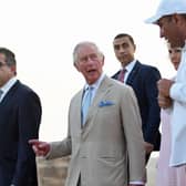 Britain's Prince Charles and Camilla, Duchess of Cornwall, are pictured during a visit to the Giza Pyramids plateau on the western outskirts of the Egyptian capital Cairo on November 18, 2021.