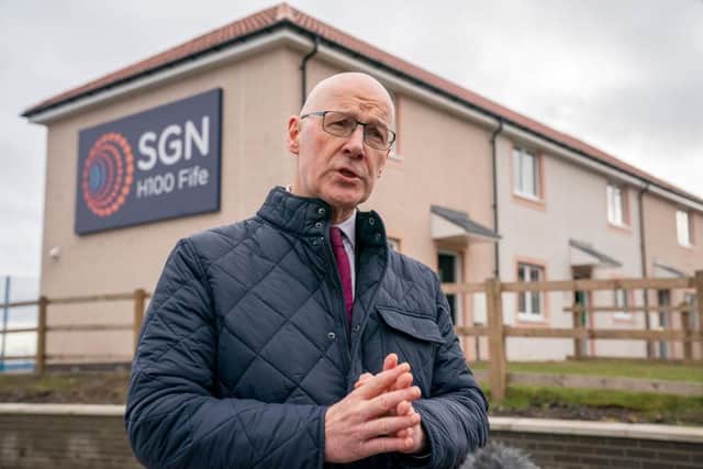 First Minister John Swinney is committed to easing barriers to workers (Picture: Jane Barlow - Pool/Getty Images)