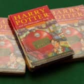 Three rare Harry Potter books are going under the gavel after being rescued from a school skip.