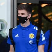 Kieran Tierney, left, and Stuart Armstrong, right, are among the Scotland players missing for tomorrow's clash with Israel.