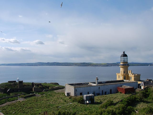 Denys McNair recommends a visit to the tiny island in the Forth, describing it as "an amazing and unique place full of mystery".