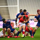 France's lock Bernard Le Roux (second from right with scrum cap) in action against Wales at the Stade de France on Saturday.