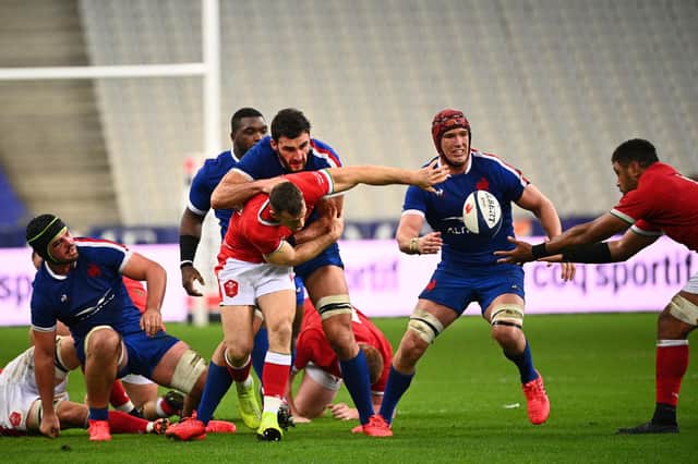 France's lock Bernard Le Roux (second from right with scrum cap) in action against Wales at the Stade de France on Saturday.