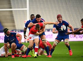 France's lock Bernard Le Roux (second from right with scrum cap) in action against Wales at the Stade de France on Saturday.