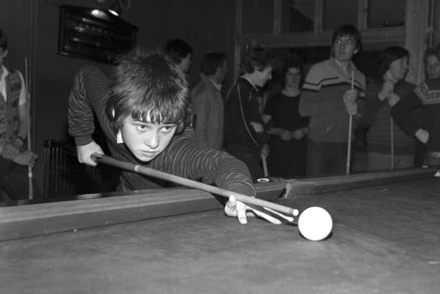 The 13-year-old Stephen Hendry prepares playing in March 1982. Picture: Bill Stout