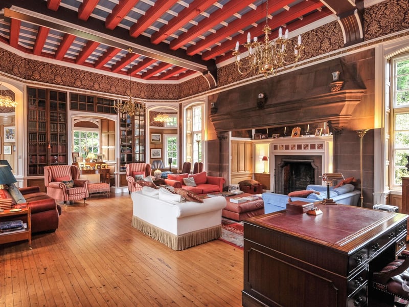 Interior: The property is adorned with period features and generously proportioned. Two reception rooms include the original library with its two turrets as well as a drawing room. There is a contemporary kitchen and three bedrooms, one ensuite.