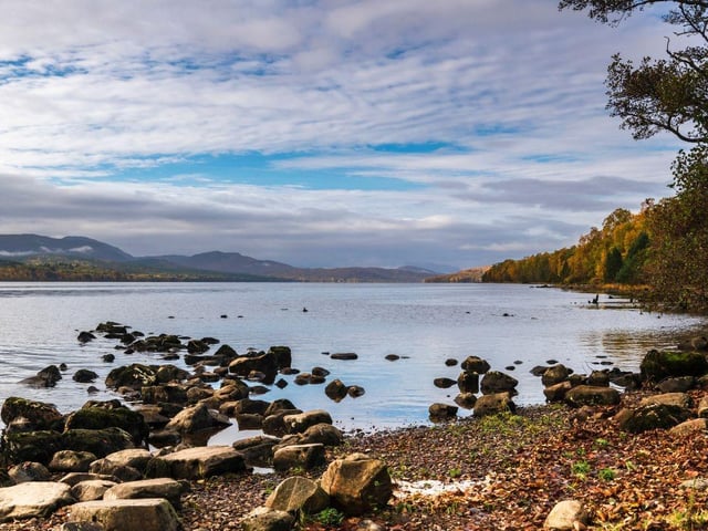 Located in Perth and Kinross, Loch Rannoch reaches a depth of 134 metres. The wild expanse of Rannoch Moor stretches out from the western banks of the loch.