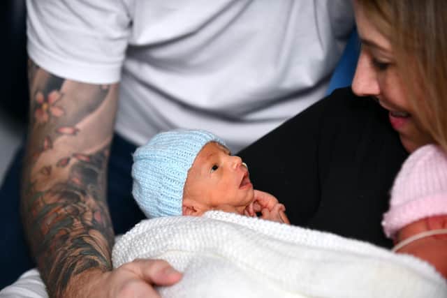 Week-old Louie with Fiona Zebik. Pic: Michael Gillen