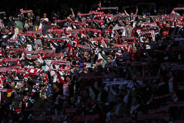 Fans of RB Leipzig cheer on their team during last weekend's match against Union Berlin.