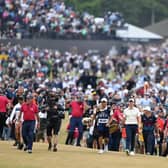 Rory McIlroy and his caddie Harry Diamond walk to the 18th green during the final round at the Old Course, St Andrews, Scotland. Pic: Ian Rutherford