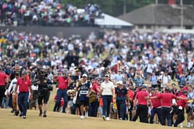 Rory McIlroy and his caddie Harry Diamond walk to the 18th green during the final round at the Old Course, St Andrews, Scotland. Pic: Ian Rutherford