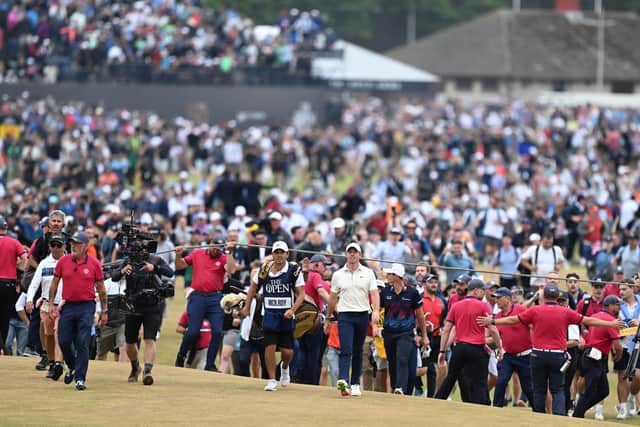 Rory McIlroy and his caddie Harry Diamond walk to the 18th green during the final round at the Old Course, St Andrews, Scotland. Pic: Ian Rutherford