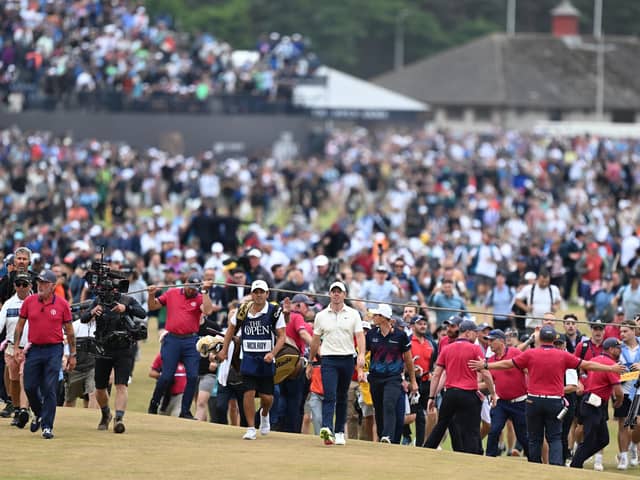 Rory McIlroy and his caddie Harry Diamond walk to the 18th green during the final round at the Old Course, St Andrews, Scotland. Pic: Ian Rutherford